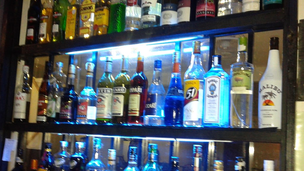 Shelves of liqour in a Cambodian bar.
