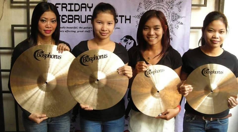 Four gorgeous Cambodian women holding Bosphorus cymbals.
