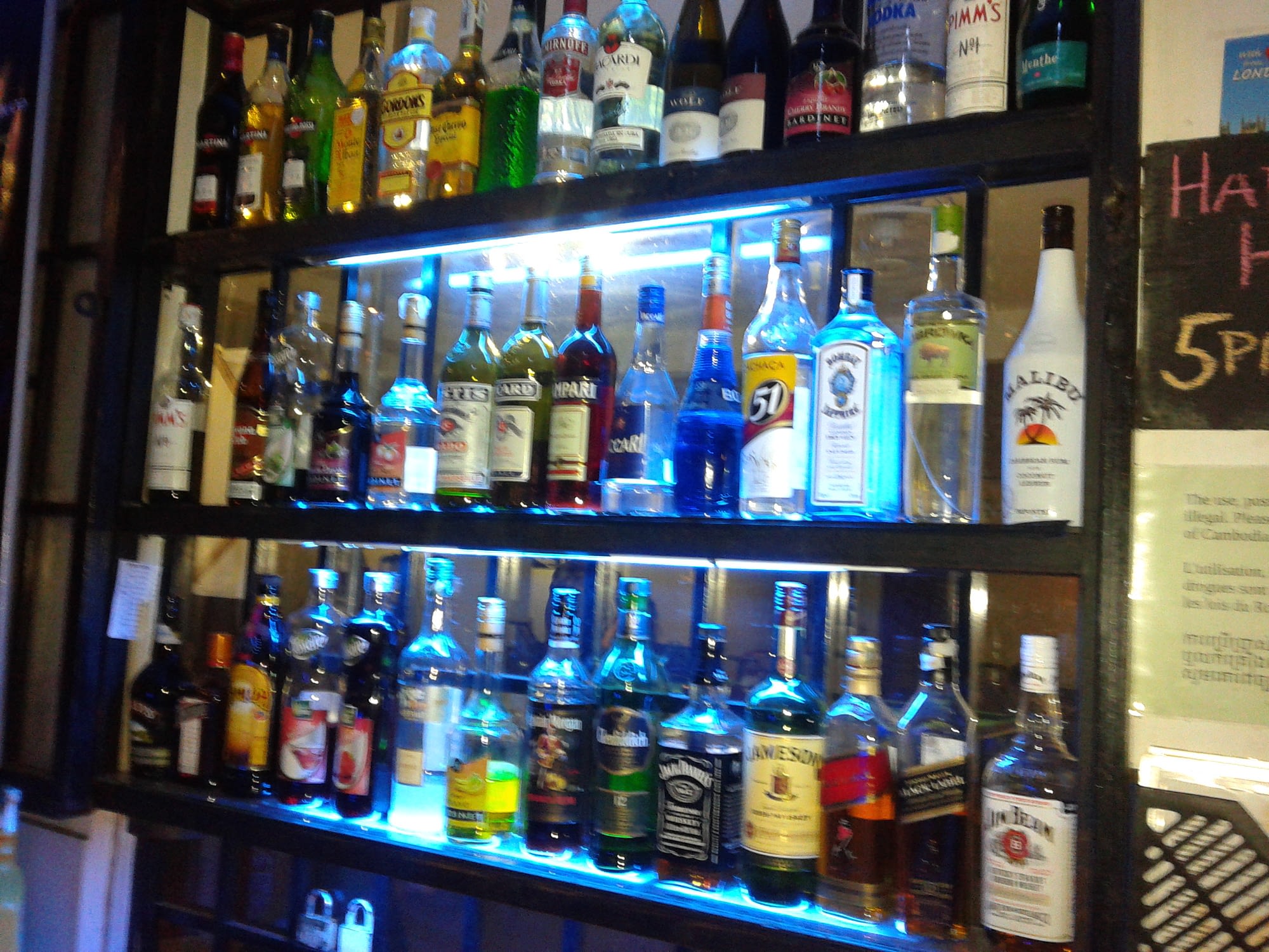 Bottles of alcohol on the shelves of Equinox.