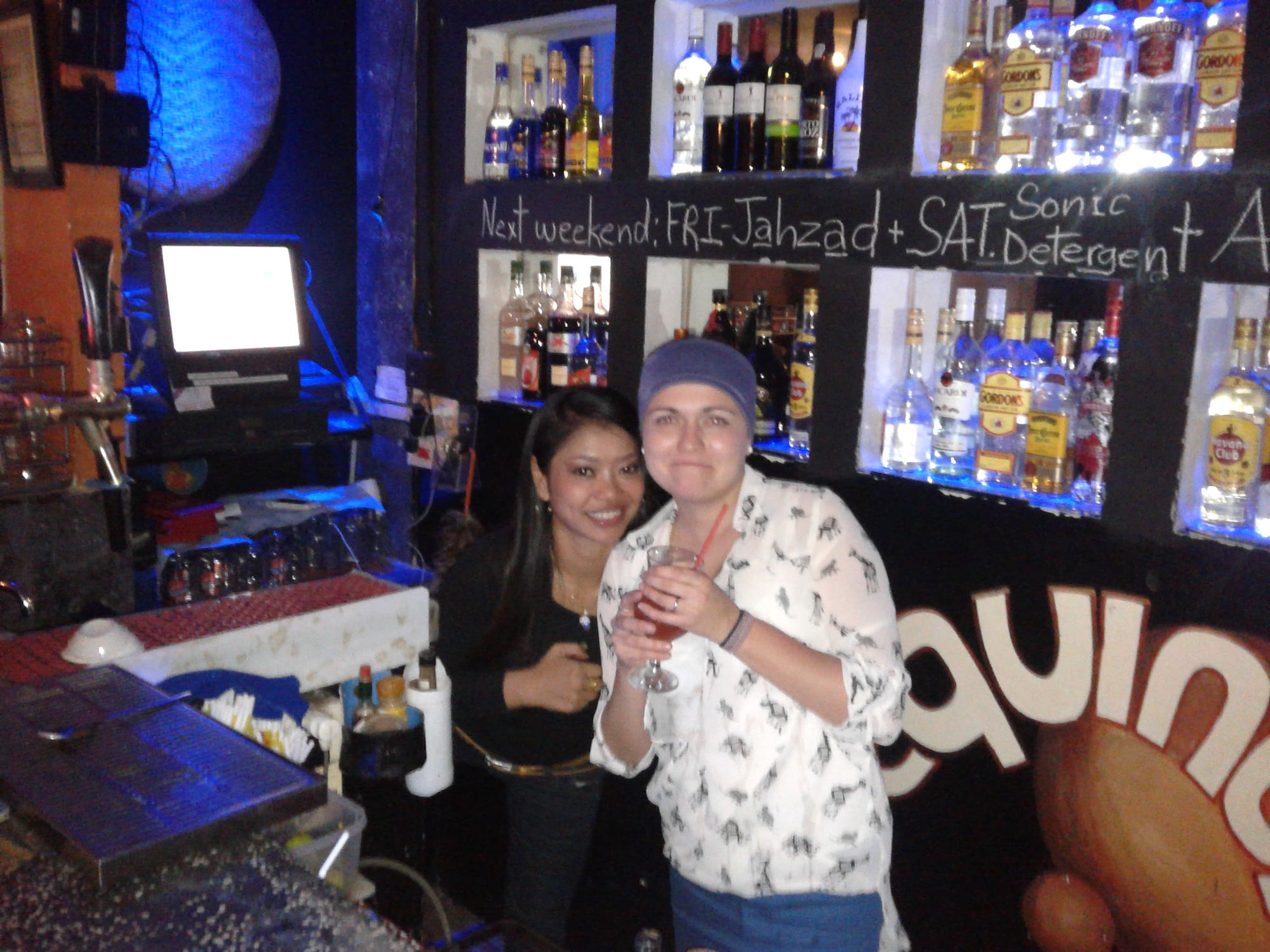 Nyny and Russian tourist at upstairs bar at Equinox.